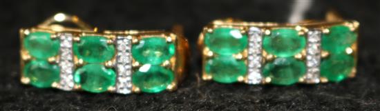 A modern pair of 18ct gold, emerald and diamond cluster earrings, 0.75in.